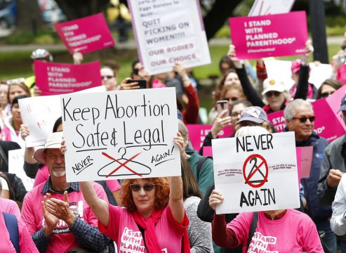 Trump administration agrees to delay health care