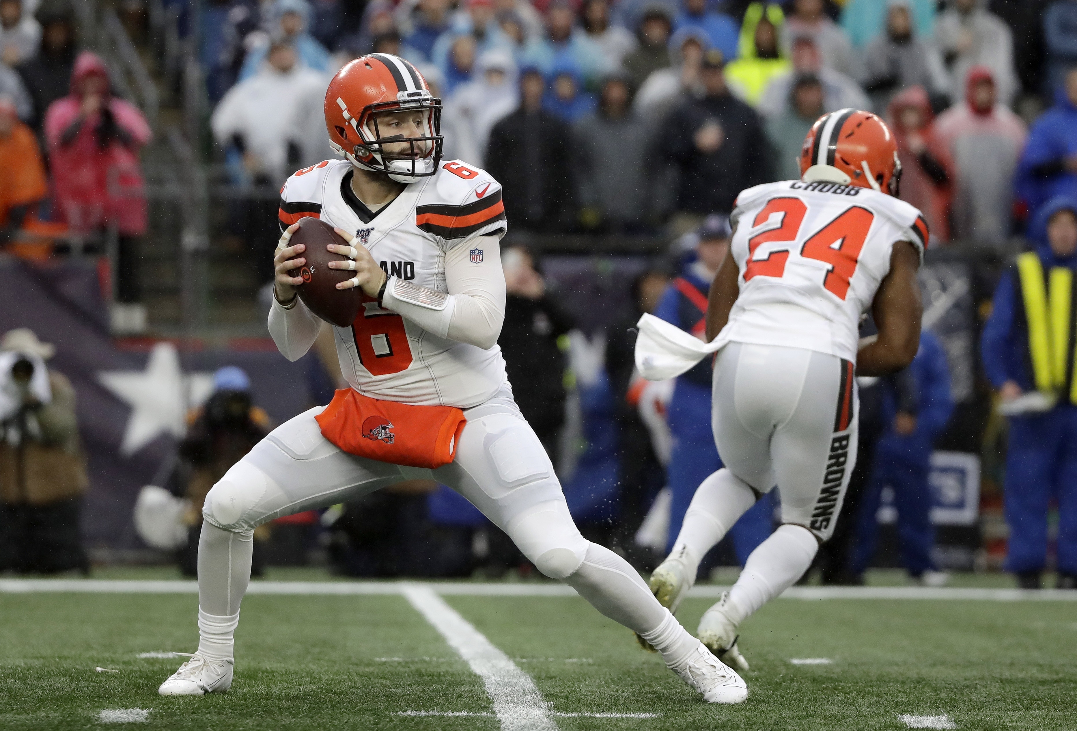 Cleveland Browns quarterback Baker Mayfield drops back to pass against the ...
