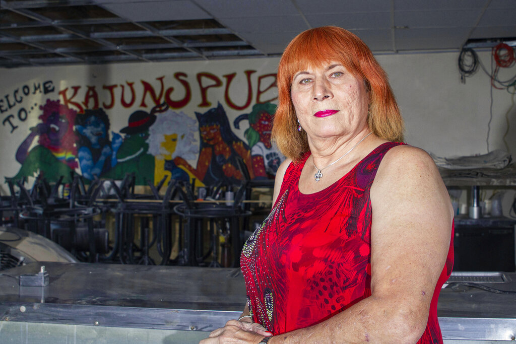 Virus dims Carnival joy and commerce on a New Orleans street