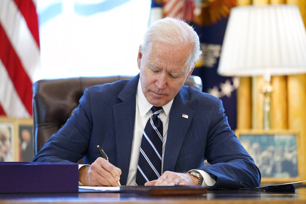 Biden signs $1.9T relief bill before speech to nation