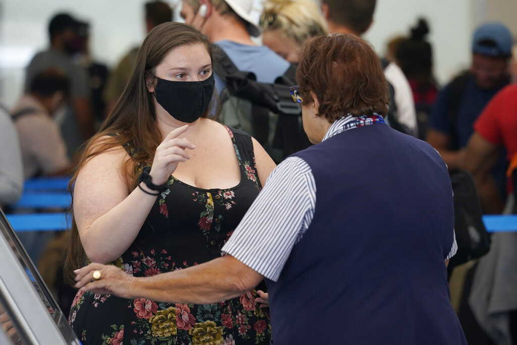 Majority of Americans want masks for travelers: AP-NORC poll
