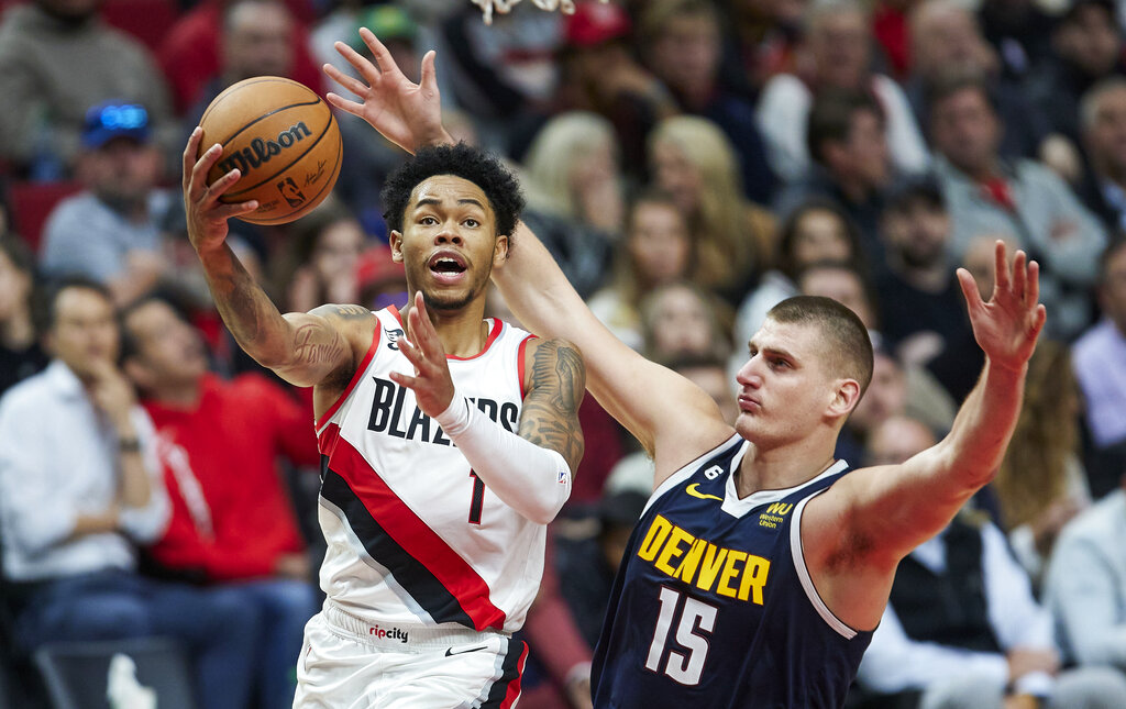 Simons, Lillard lead unbeaten Blazers past Nuggets 135-110