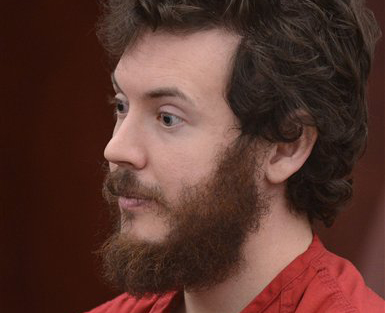 James Holmes, Aurora theater shooting suspect, sits in the courtroom during his arraignment in Centennial, Colo., on Tuesday, March 12, 2013. Judge William Blair Sylvester entered a not guilty plea on behalf of James Holmes on Tuesday after the former graduate student's defense team said he was not ready to enter one. (AP Photo/Denver Post, RJ Sangosti, Pool)